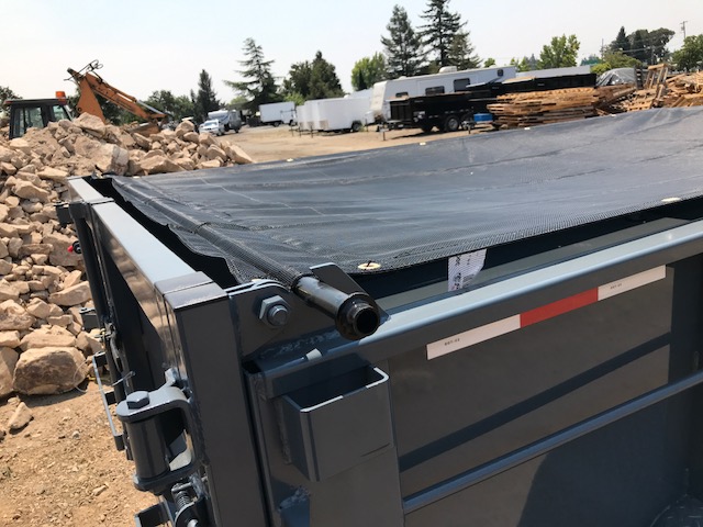 Iron Panther dump trailer with tarp over the top